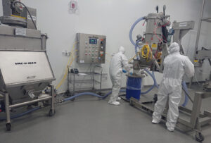 Continuous powder processing system